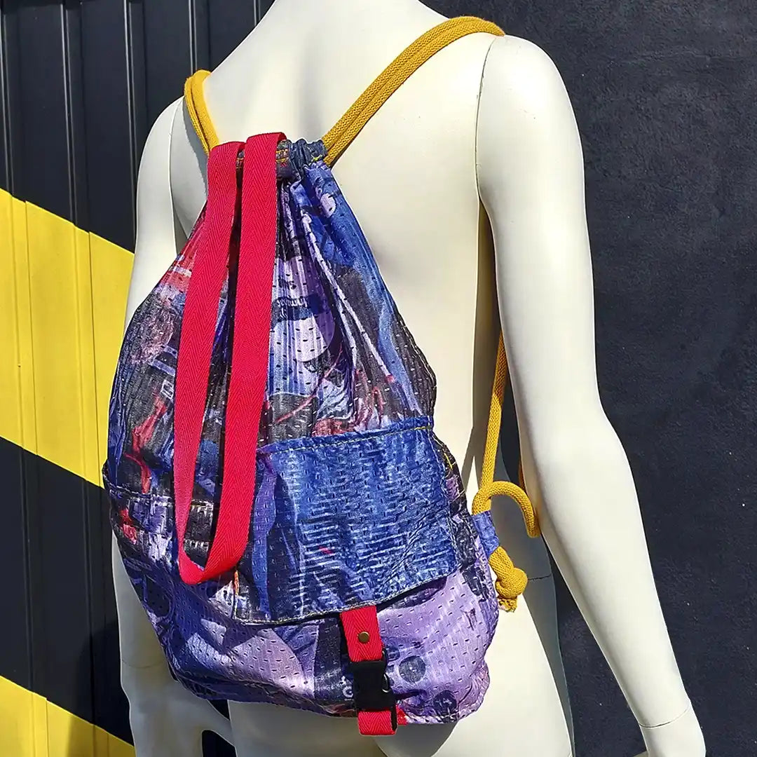 The Inês Backpack by ReCreate transforms reclaimed sports-event polyester into a light, washable and versatile backpack for everyday movement.