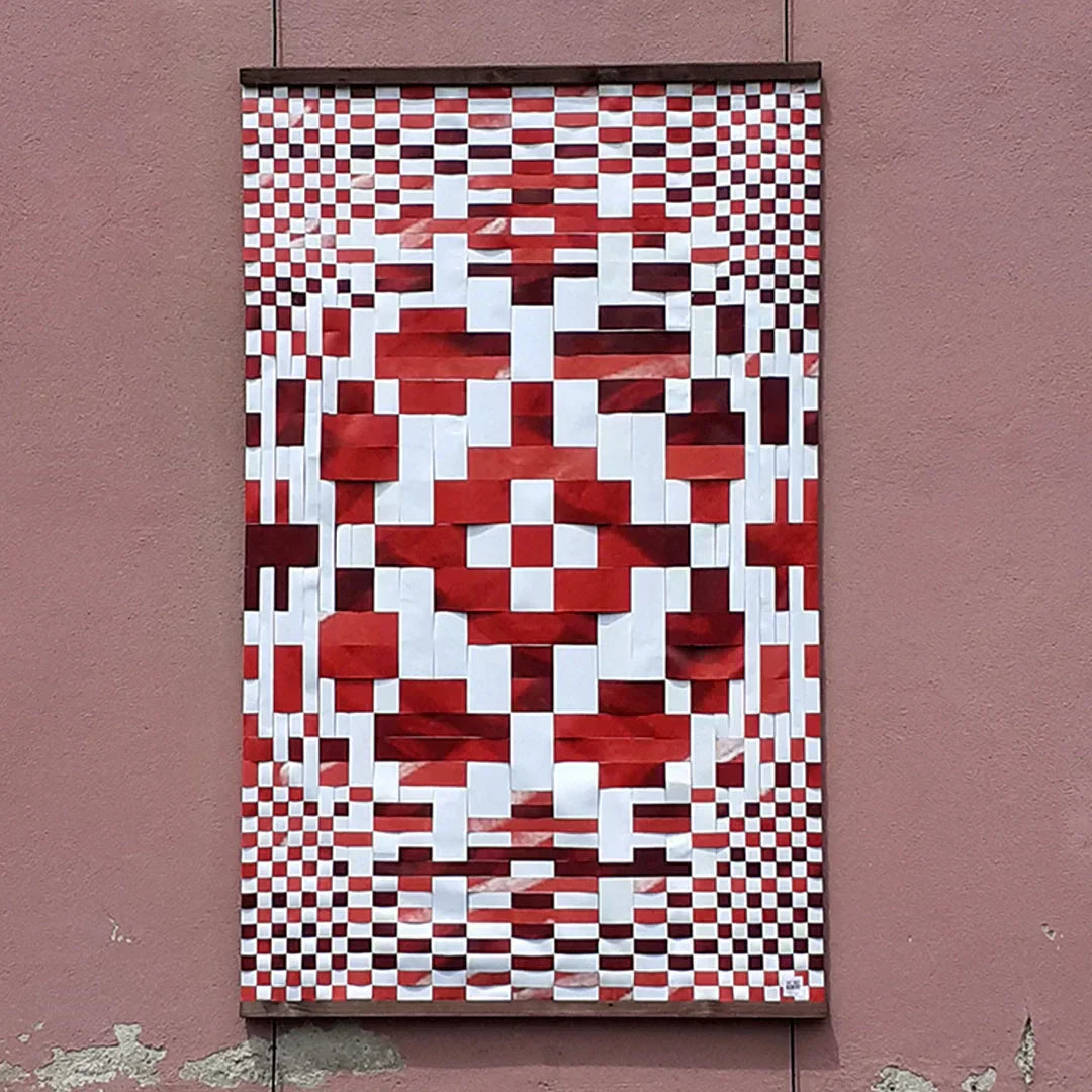 Padrões do Mundo presents Carla Lopes’ first solo exhibition, transforming reclaimed advertising banners into geometric panels by ReCreate.