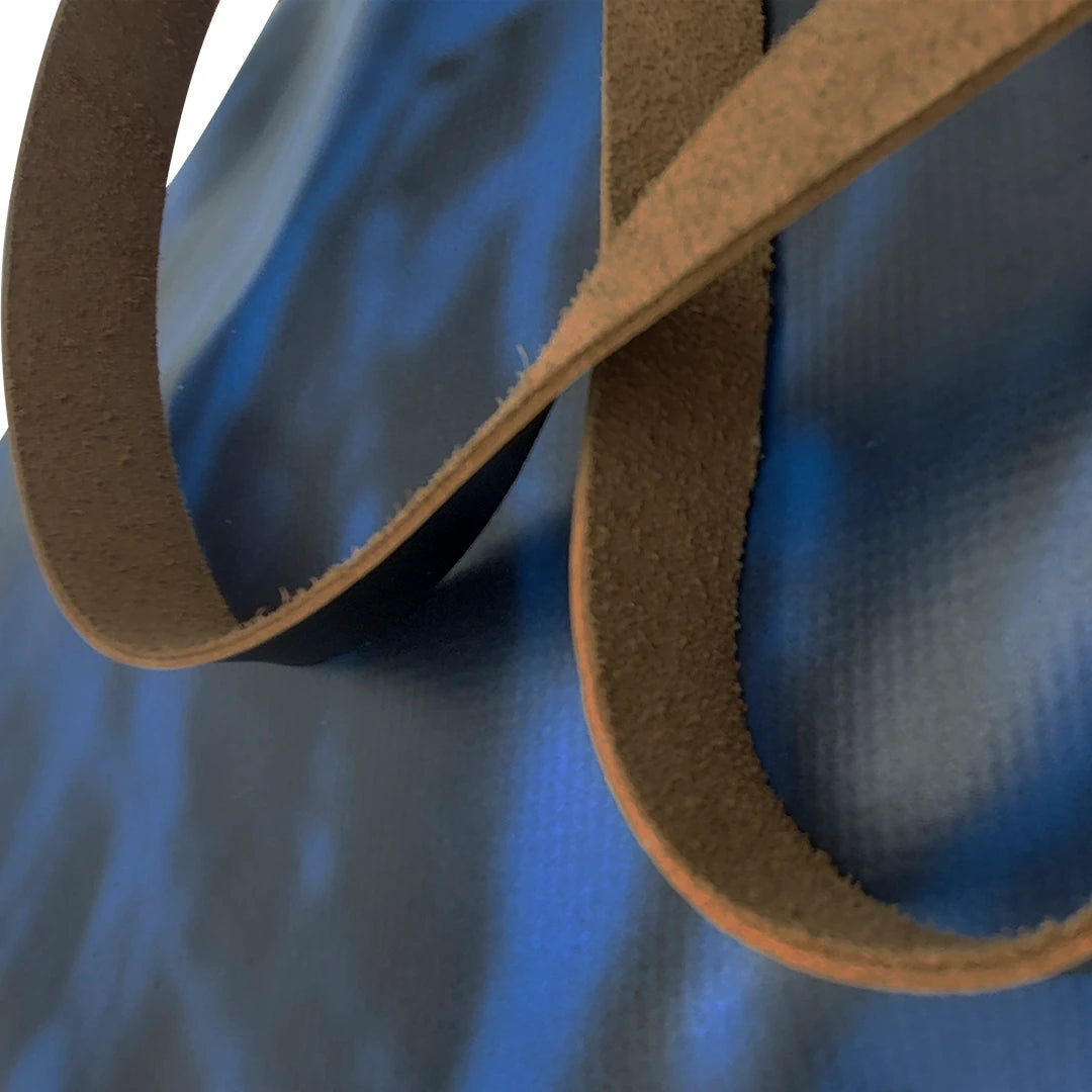 Handmade blue Alex bag from reclaimed advertising banner material, with leather handles and one interior pocket. Unique and numbered. - detail