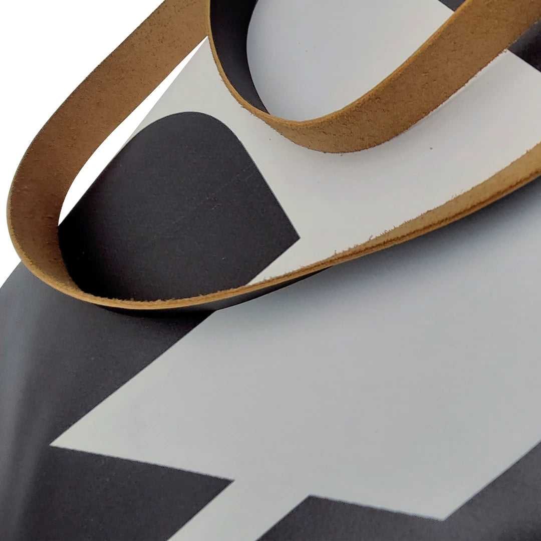 Handmade tote bag crafted from reclaimed banner material with leather handles and an interior pocket. A unique numbered piece made in Lisbon by ReCreate. - detail