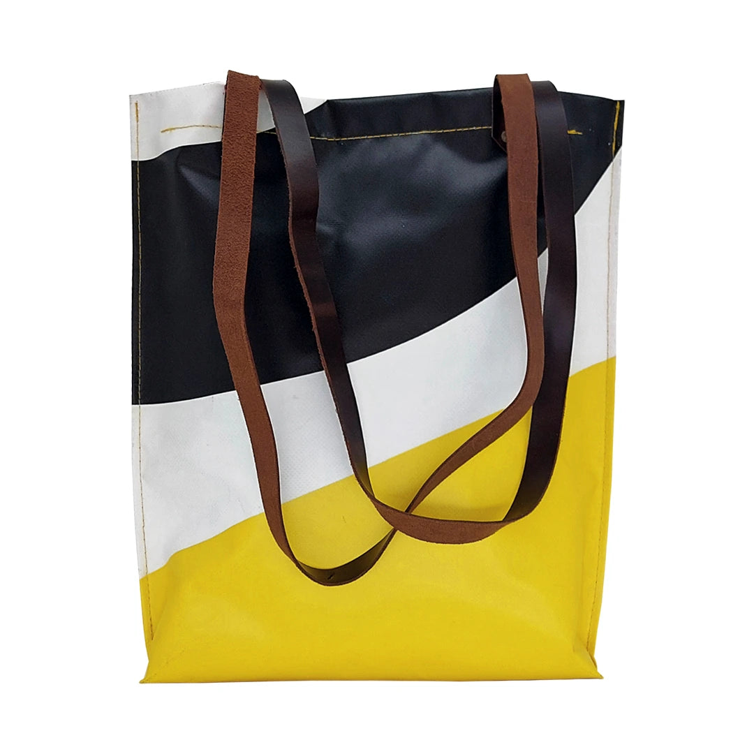 Alex Bag 6024 by ReCreate, a yellow tote in reclaimed advertising banner with leather straps and one inner pocket. - front
