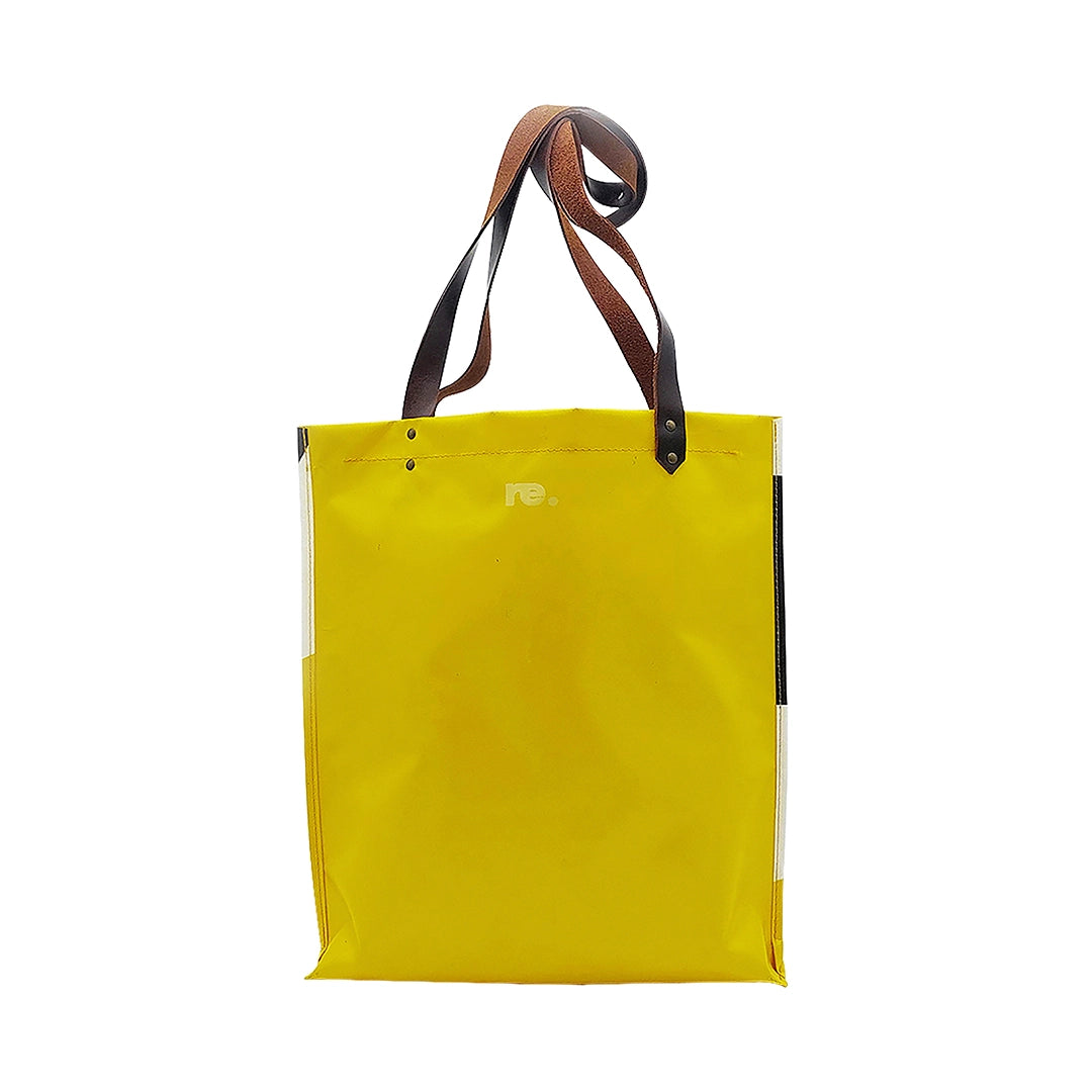 Alex Bag 6024 by ReCreate, a yellow tote in reclaimed advertising banner with leather straps and one inner pocket. - back
