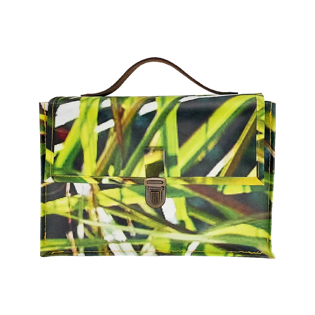 Alice Bag 126 by ReCreate, a structured bag in reclaimed advertising banner with green graphic movement and leather strap. - front