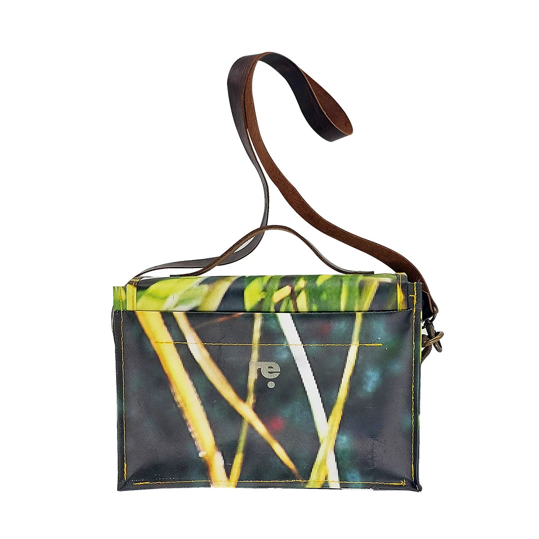 Alice Bag 126 by ReCreate, a structured bag in reclaimed advertising banner with green graphic movement and leather strap.  back