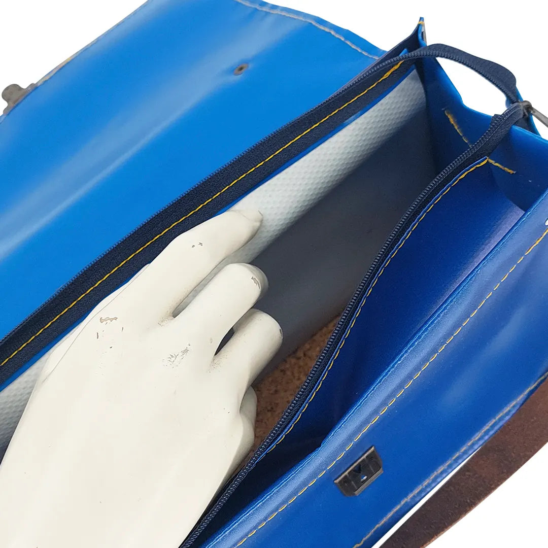 Alice Special Edition Bag 126 by ReCreate, a blue structured bag in reclaimed advertising banner with woven flap and leather strap. - zipper
