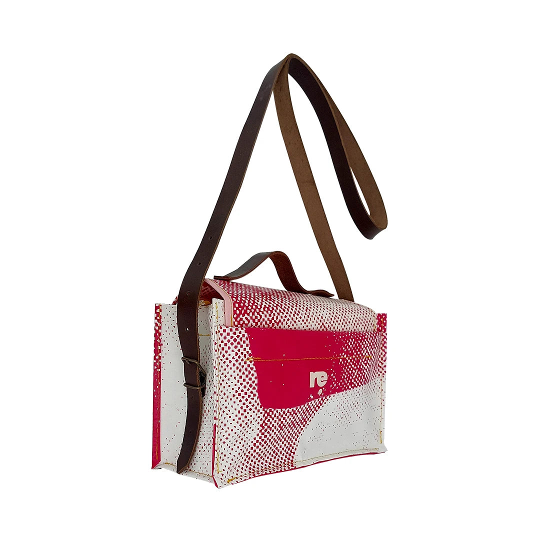 Alice Bag 425 by ReCreate, a fuchsia and white structured bag in reclaimed advertising banner with leather strap and yellow zip. - detail