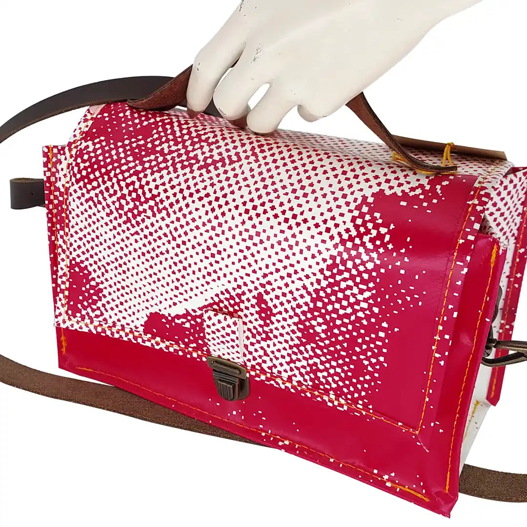 Alice Bag 425 by ReCreate, a fuchsia and white structured bag in reclaimed advertising banner with leather strap and yellow zip. - hand