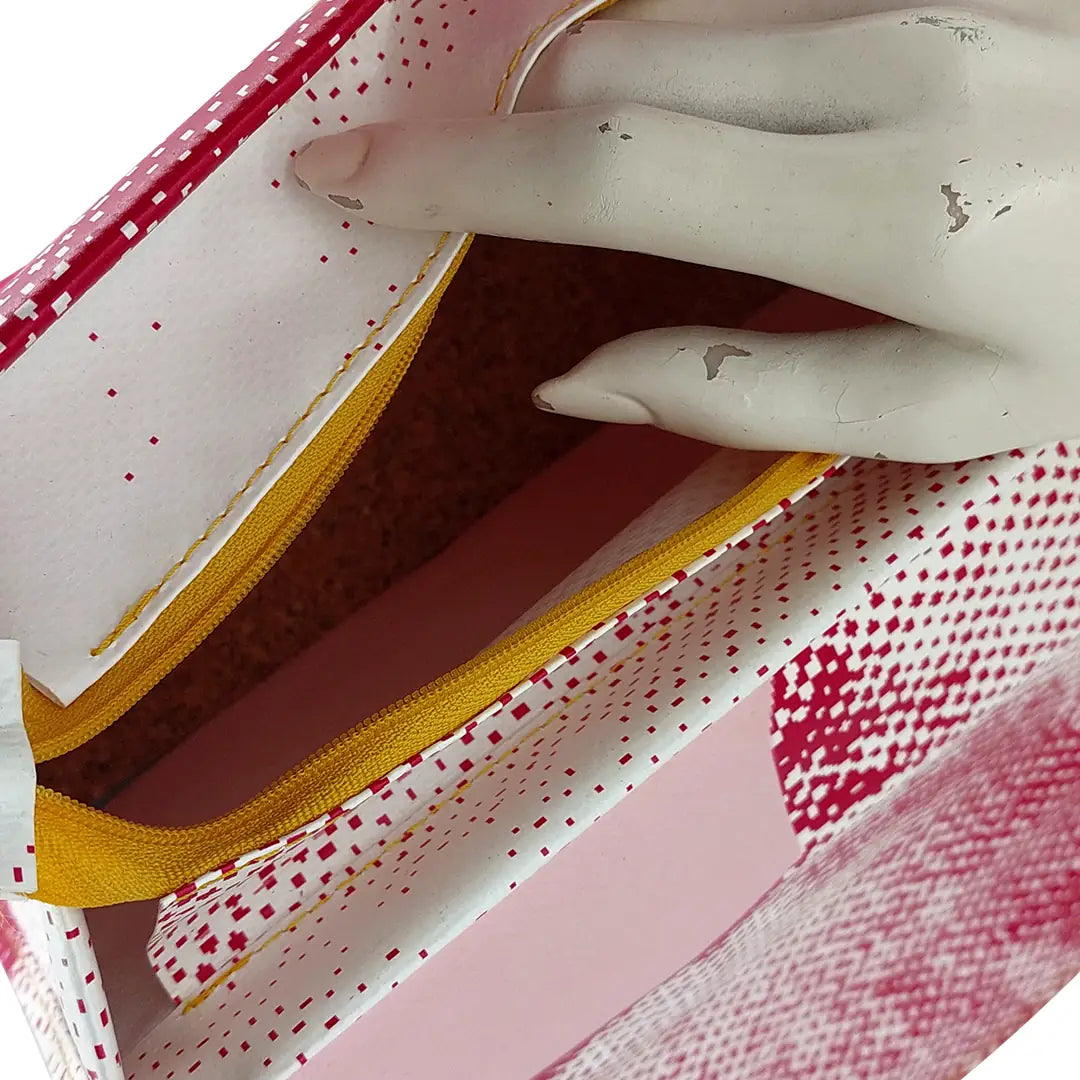 Alice Bag 425 by ReCreate, a fuchsia and white structured bag in reclaimed advertising banner with leather strap and yellow zip. - zipper