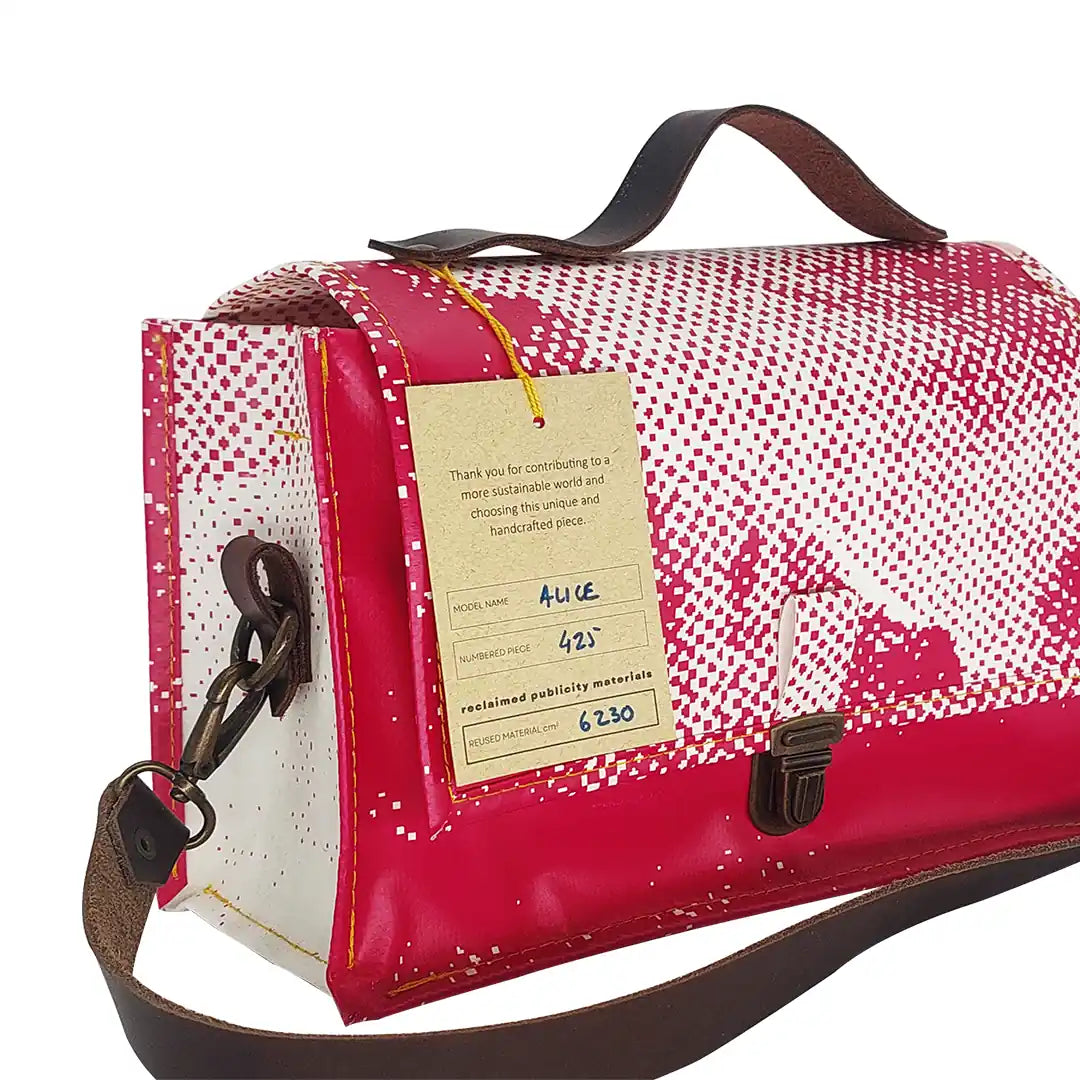 Alice Bag 425 by ReCreate, a fuchsia and white structured bag in reclaimed advertising banner with leather strap and yellow zip. - tag