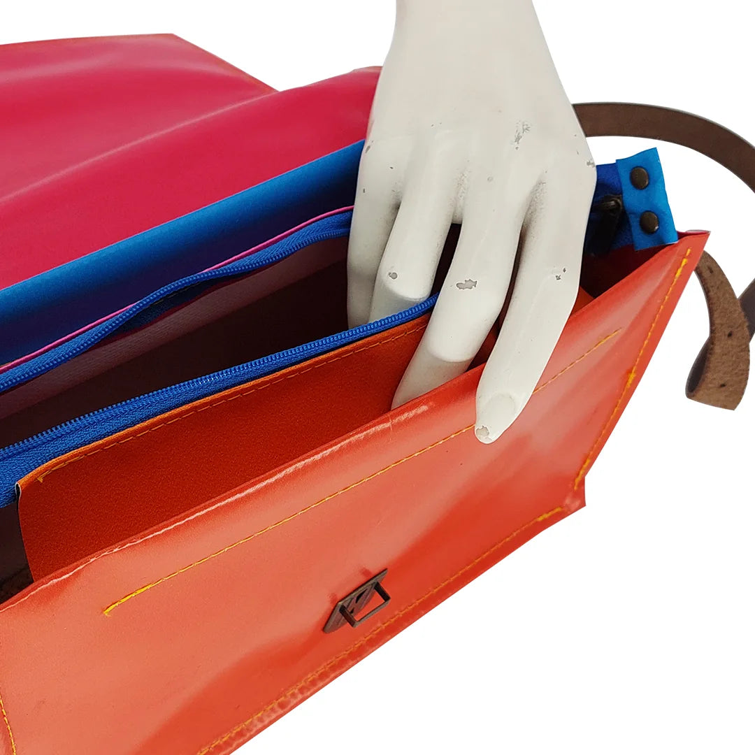 Alice Special Edition Bag 625 by ReCreate, a vibrant special edition bag in reclaimed advertising banner with woven flap and leather strap. - zipper
