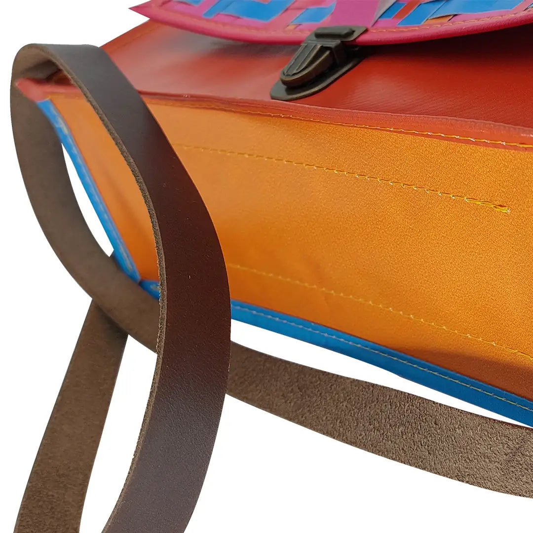 Alice Special Edition Bag 625 by ReCreate, a vibrant special edition bag in reclaimed advertising banner with woven flap and leather strap. - bottom