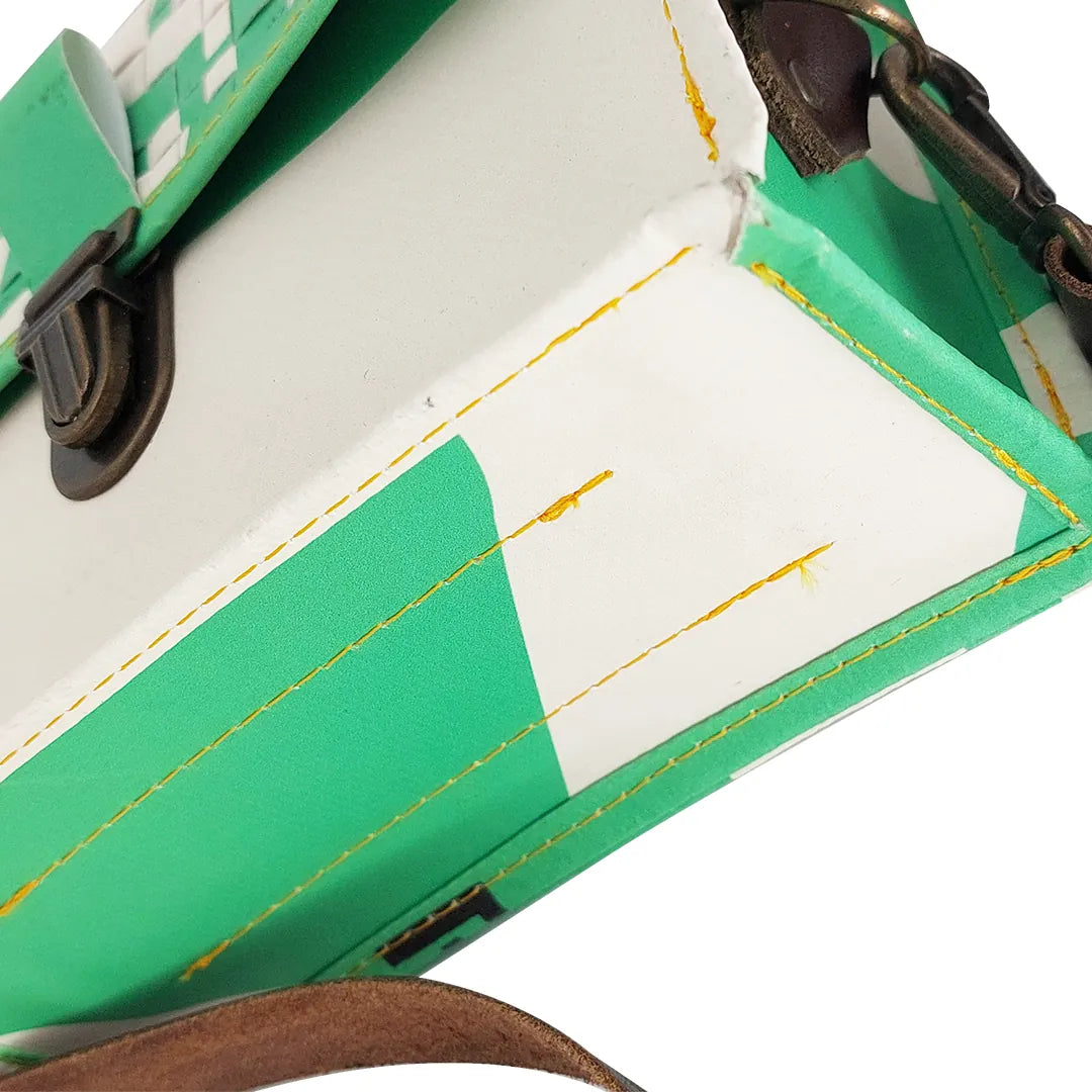 Anita Bag 224 Special Edition by ReCreate, a compact green bag in reclaimed advertising banner with woven flap and leather strap. - bottom