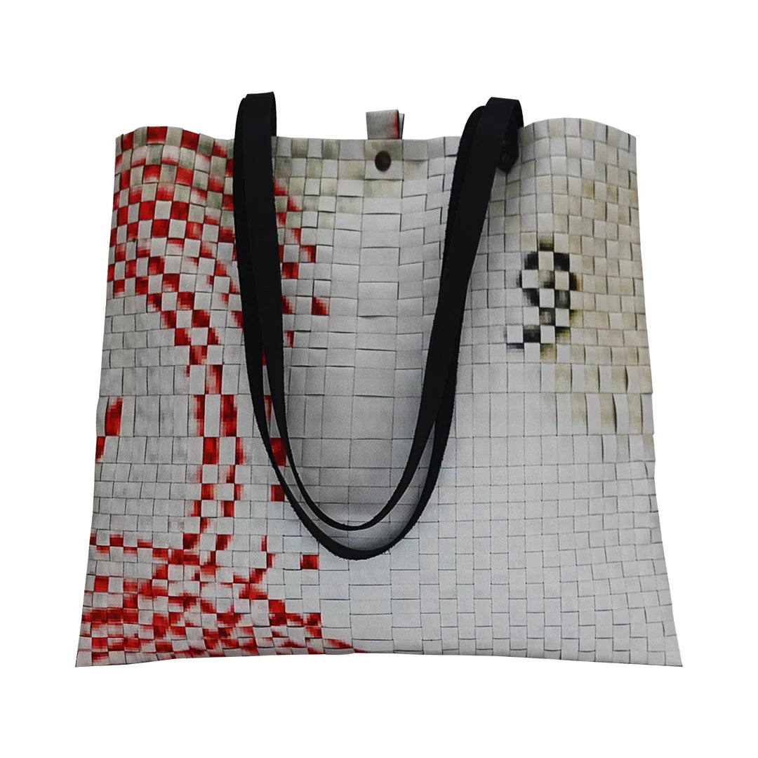 Emilia Bag 1623 by ReCreate, a large tote bag in reclaimed advertising banner with woven detail, leather straps and an interior pocket. - front