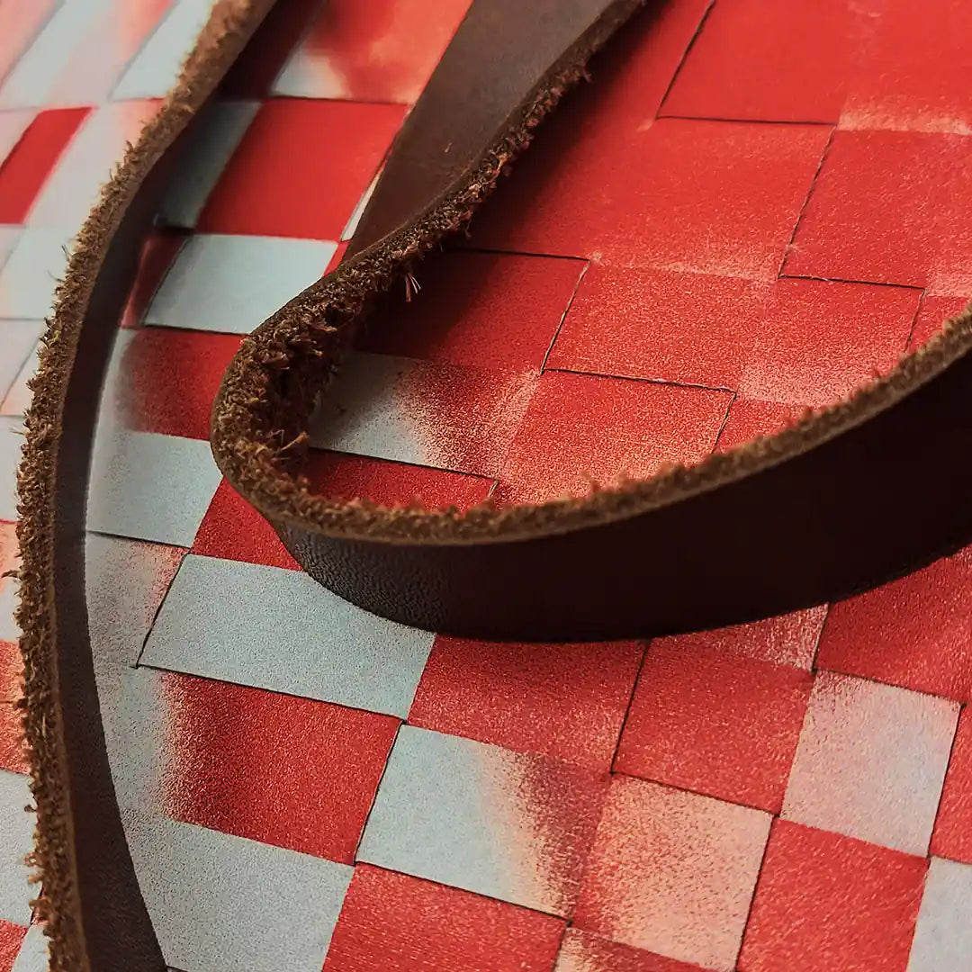 Emilia Bag 323 by ReCreate, a large tote bag in reclaimed advertising banner with one woven side, one smooth side and leather straps. - detail