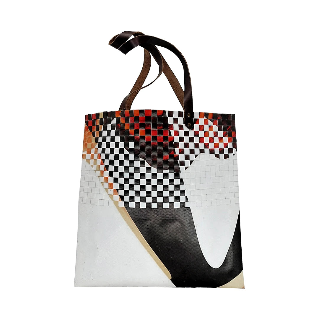 Inversa Bag 5723 by ReCreate, a graphic tote in reclaimed advertising banner with inverted weaving, leather straps and one inner pocket. - back