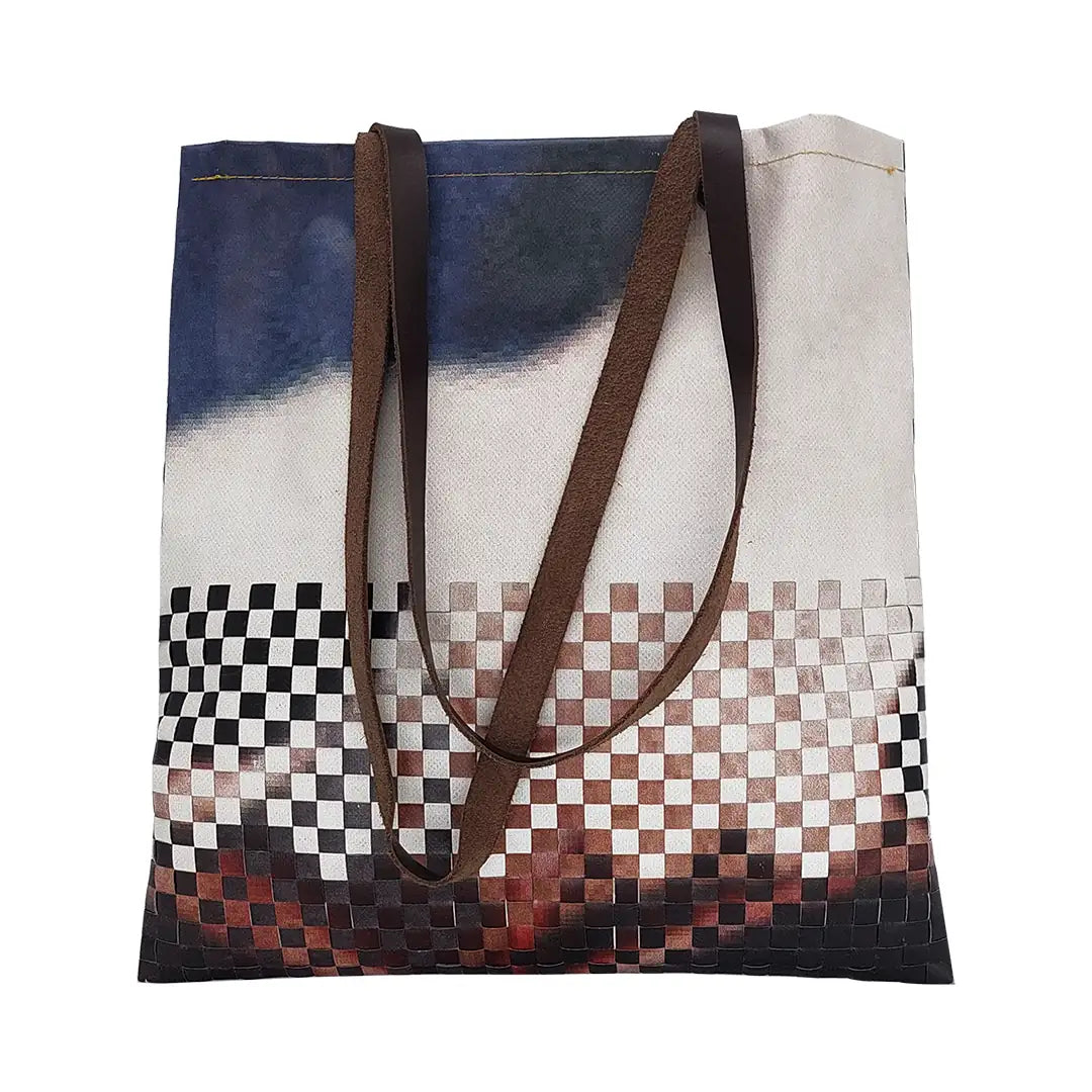 Inversa Bag 5923 by ReCreate, a tote in reclaimed advertising banner with inverted weaving, leather straps and one inner pocket. - front