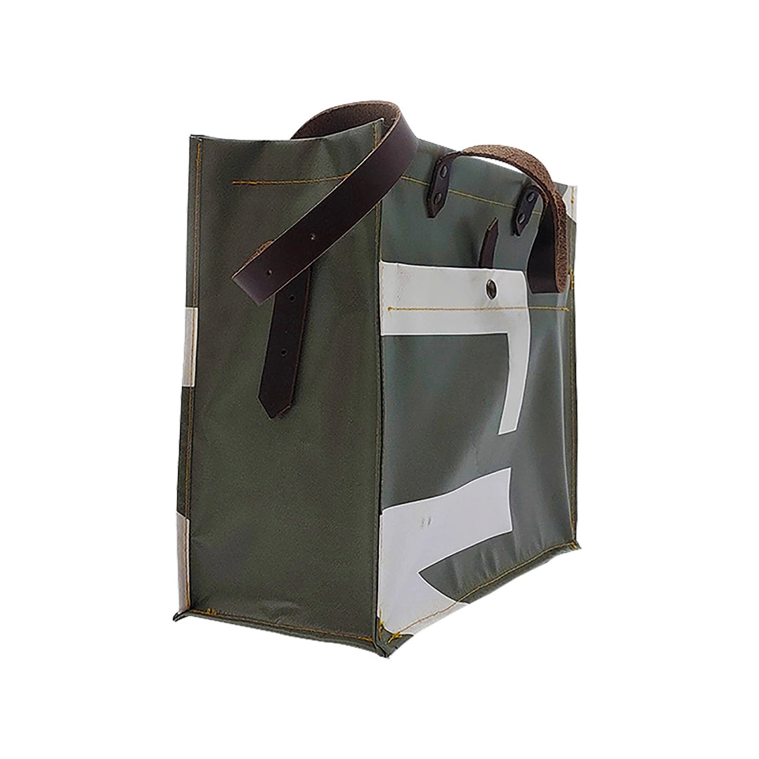 Julieta Bag 224 Special Edition by ReCreate, a structured green bag in reclaimed advertising banner with leather straps and graphic weaving-side