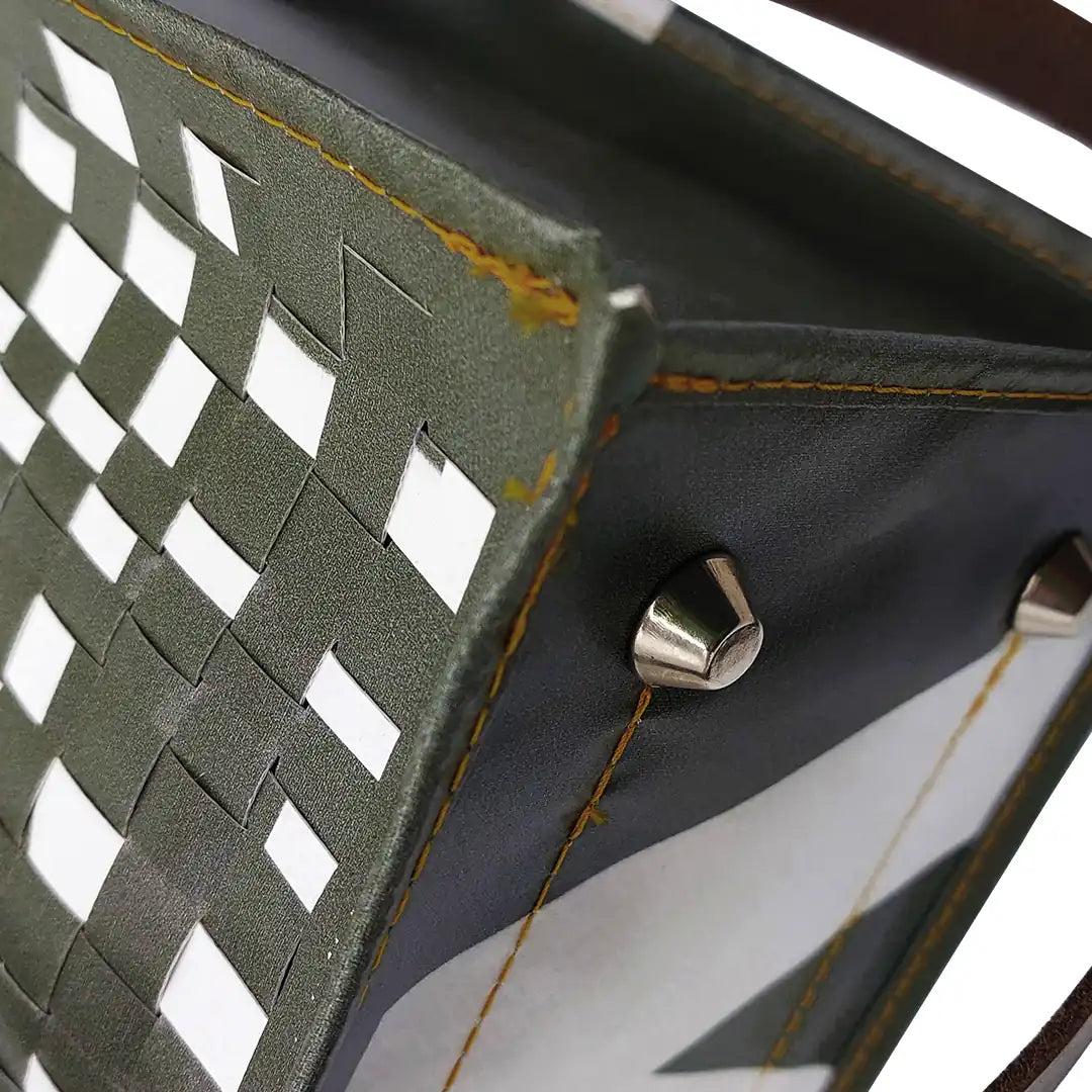 Julieta Bag 224 Special Edition by ReCreate, a structured green bag in reclaimed advertising banner with leather straps and graphic weaving - bottom