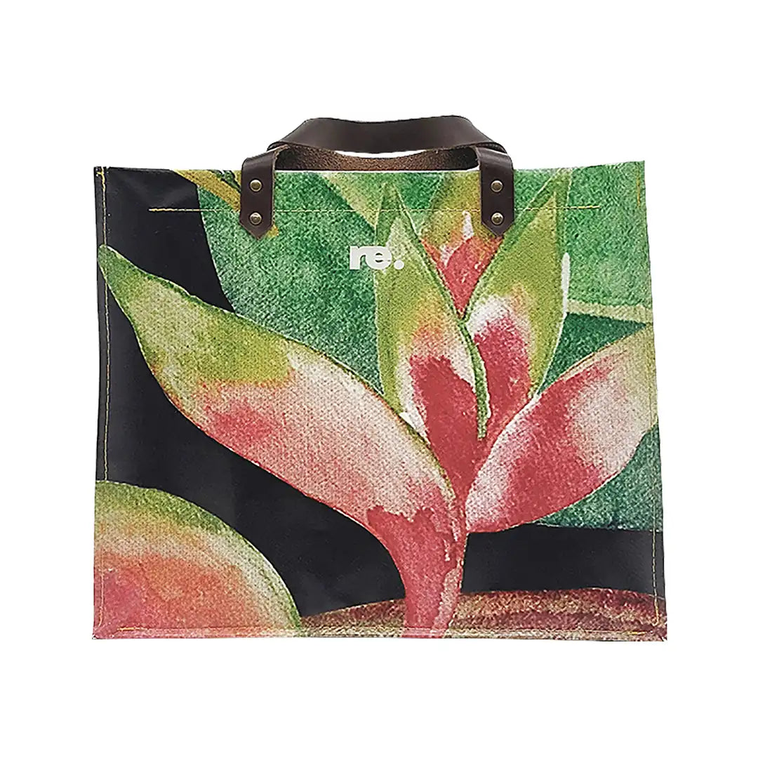 Julieta Bag 324 by ReCreate, a structured bag in reclaimed advertising banner with leather straps, zip closure and botanical graphic presence. - front