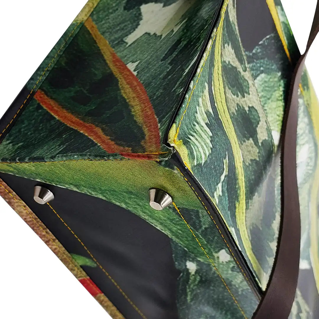 Julieta Bag 324 by ReCreate, a structured bag in reclaimed advertising banner with leather straps, zip closure and botanical graphic presence. - bottom