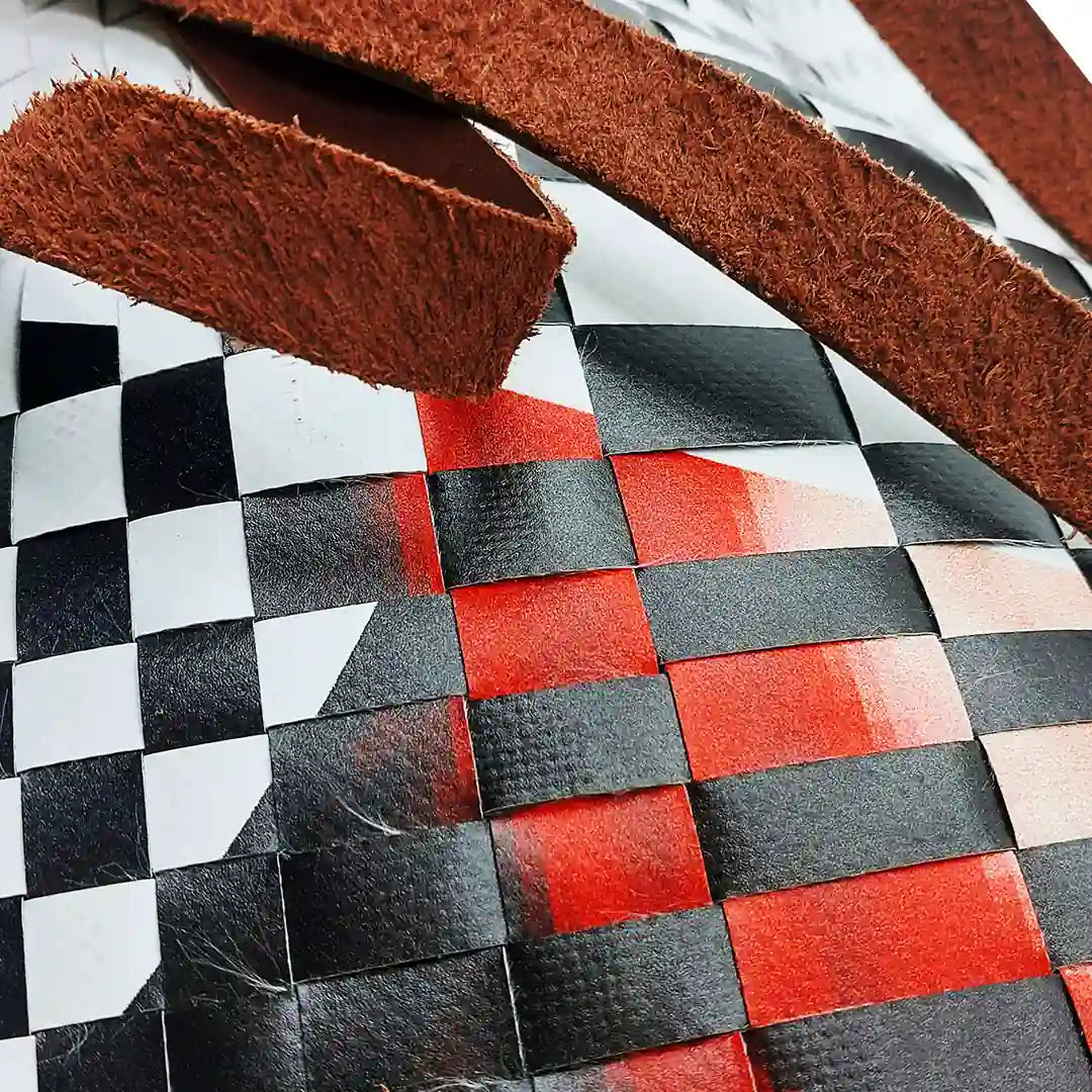 Rita Bag 523 by ReCreate, a black, white and red tote made from reclaimed advertising banner with leather straps and one inner pocket. - detail