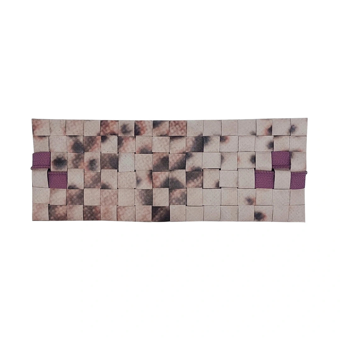 Slim one-of-a-kind pouch made from reused advertising material, with a dusty purple zip and handwoven back detail. - back