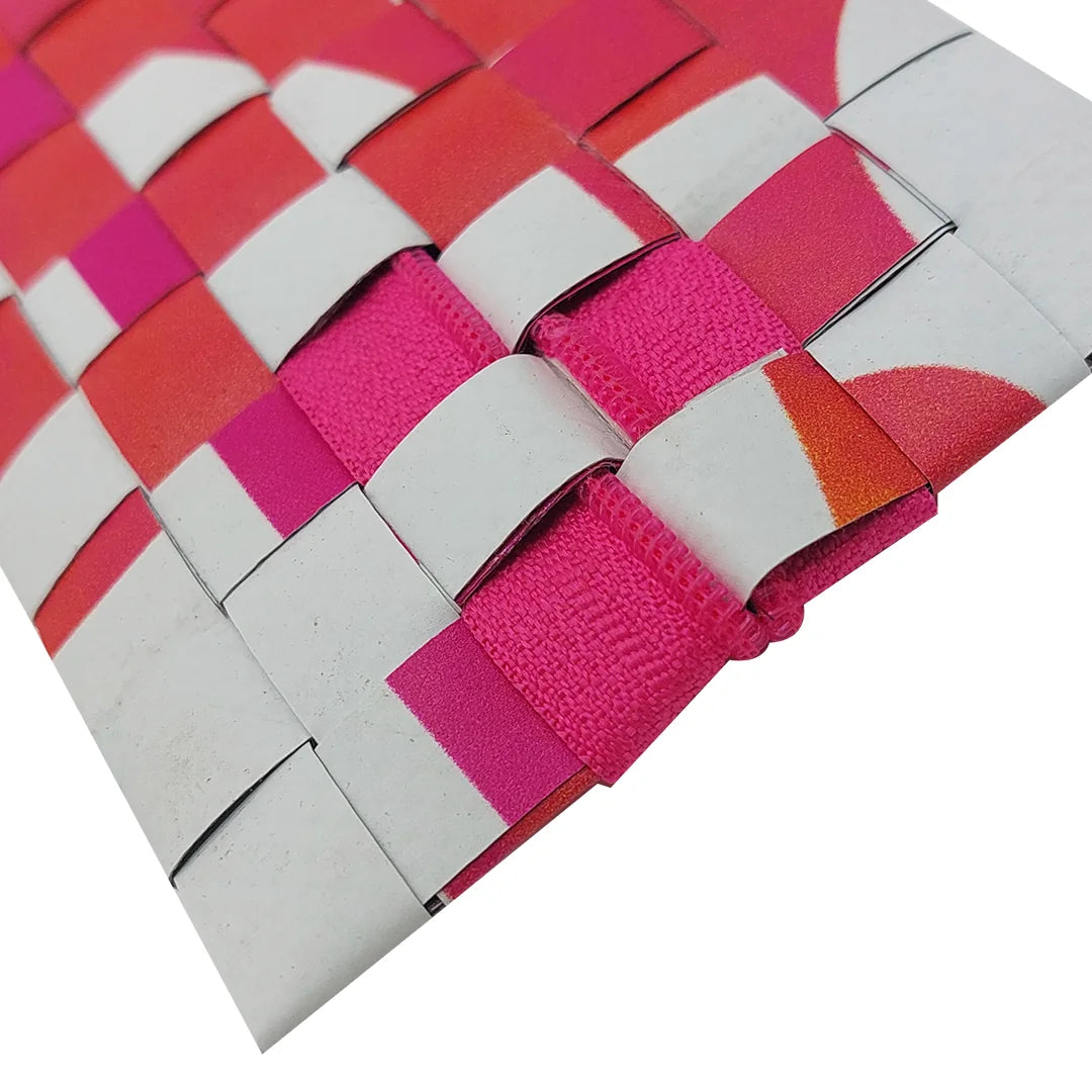 Bright one-of-a-kind pouch made from reused advertising material, with pink zip detail and handwoven graphic back. - detail