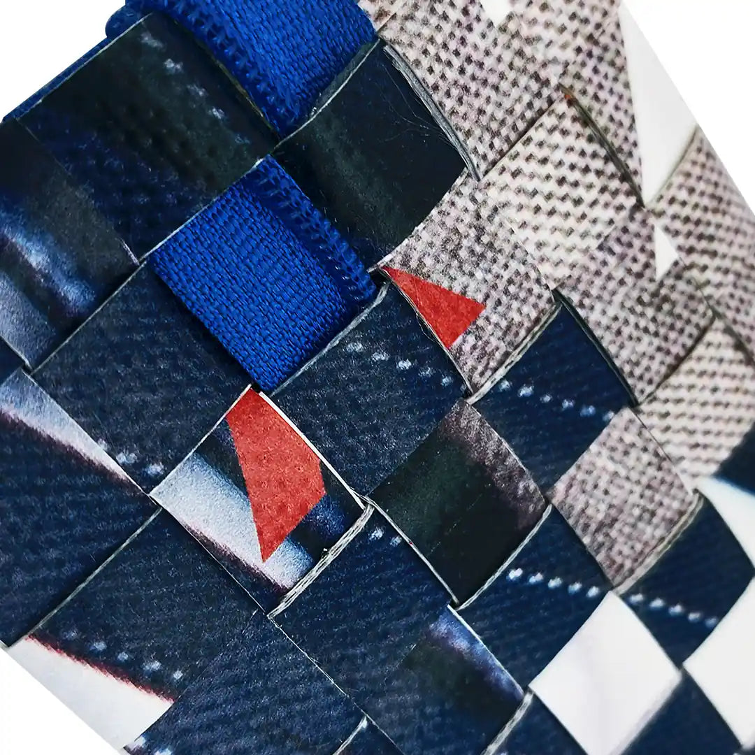 Dali Pouch 3123 by ReCreate is a reclaimed-banner pouch with blue zip, woven surface and graphic navy, white and grey fragments. - detail
