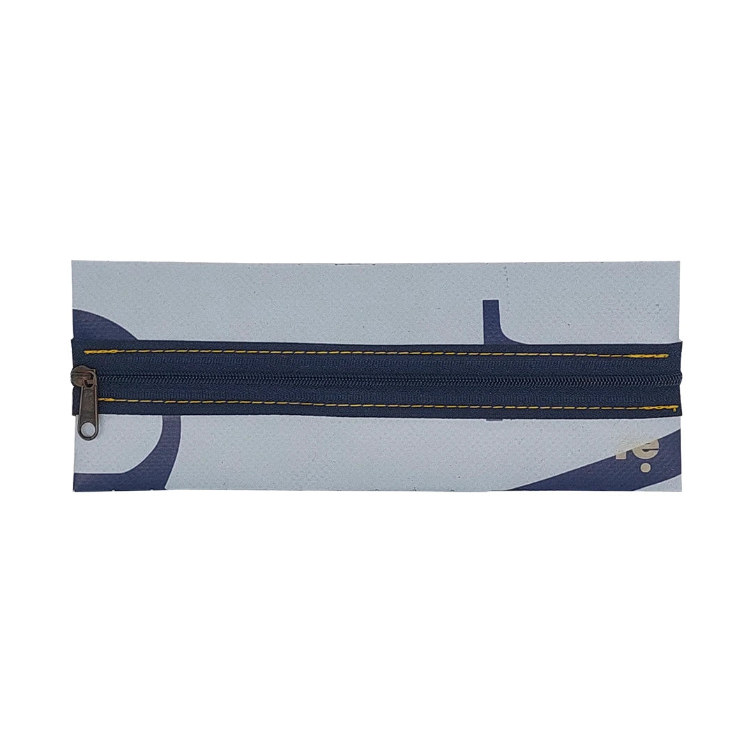 Slim pouch made from reclaimed advertising banner in soft blue and navy tones, ideal for pens, cables and everyday essentials. - front