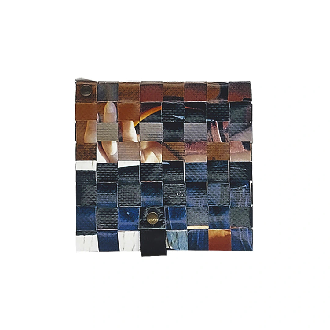 John Wallet 125 is a ReCreate wallet made from reclaimed advertising banner, with woven detail, coin space and room for 8 cards. - back