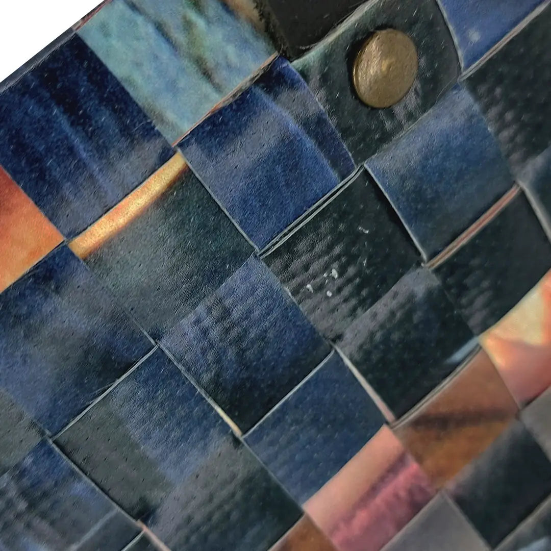 John Wallet 125 is a ReCreate wallet made from reclaimed advertising banner, with woven detail, coin space and room for 8 cards. - detail