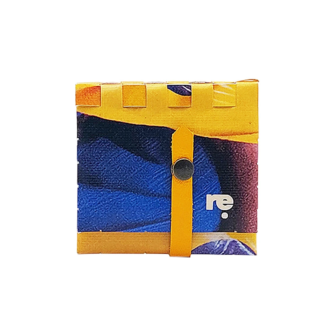 John Wallet 225 is a ReCreate wallet made from reclaimed advertising banner, with yellow-blue graphics, coin space and room for 8 cards. - front