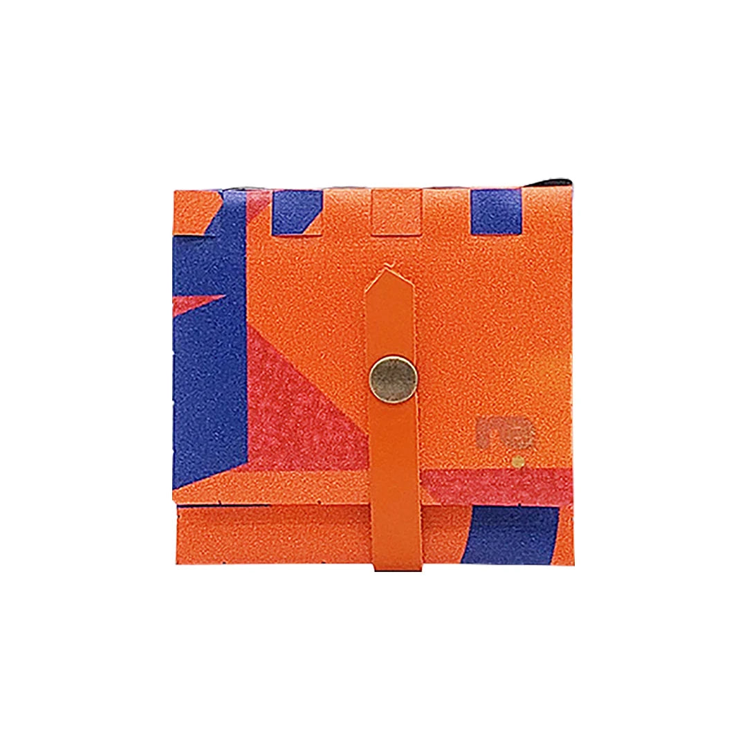 John Wallet 525 is a ReCreate wallet made from reclaimed advertising banner, with vivid orange-blue graphics, coin space and room for 8 cards. - front