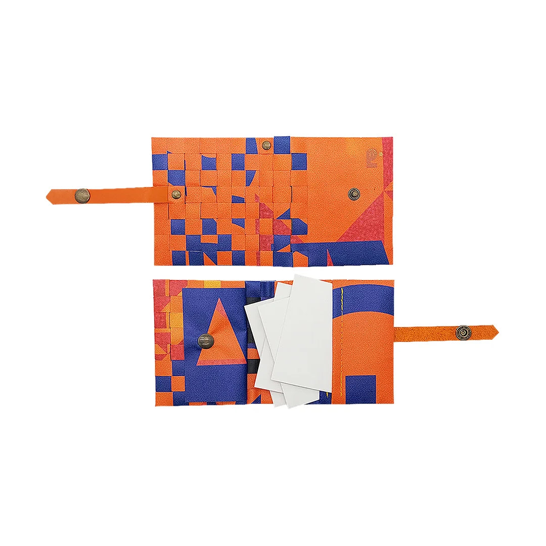 John Wallet 525 is a ReCreate wallet made from reclaimed advertising banner, with vivid orange-blue graphics, coin space and room for 8 cards.- both sides