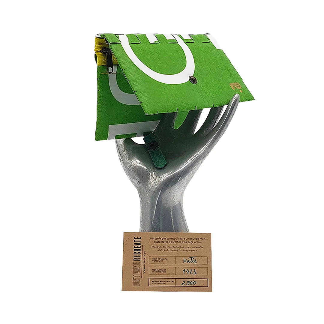 Katie Wallet 1423 by ReCreate is made from reclaimed advertising banner, with green graphic curves and space for notes, documents and money. - on hand