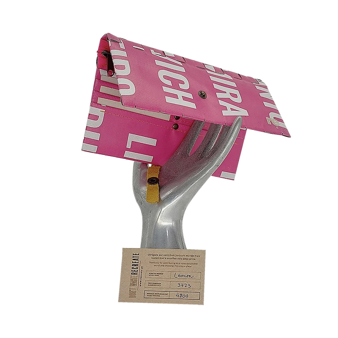 Leonor Wallet 3723 by ReCreate is a pink long wallet in reclaimed advertising banner, with space for 12 cards, documents, photos and coins. - on hand