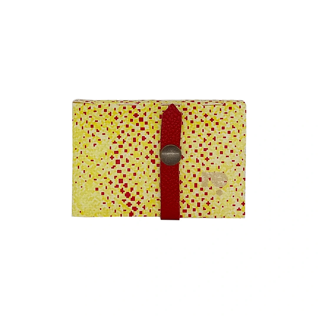 Peter Wallet 2025 is a ReCreate wallet made from reclaimed advertising banner, with red graphic marks, space for 6 cards and coins. - front