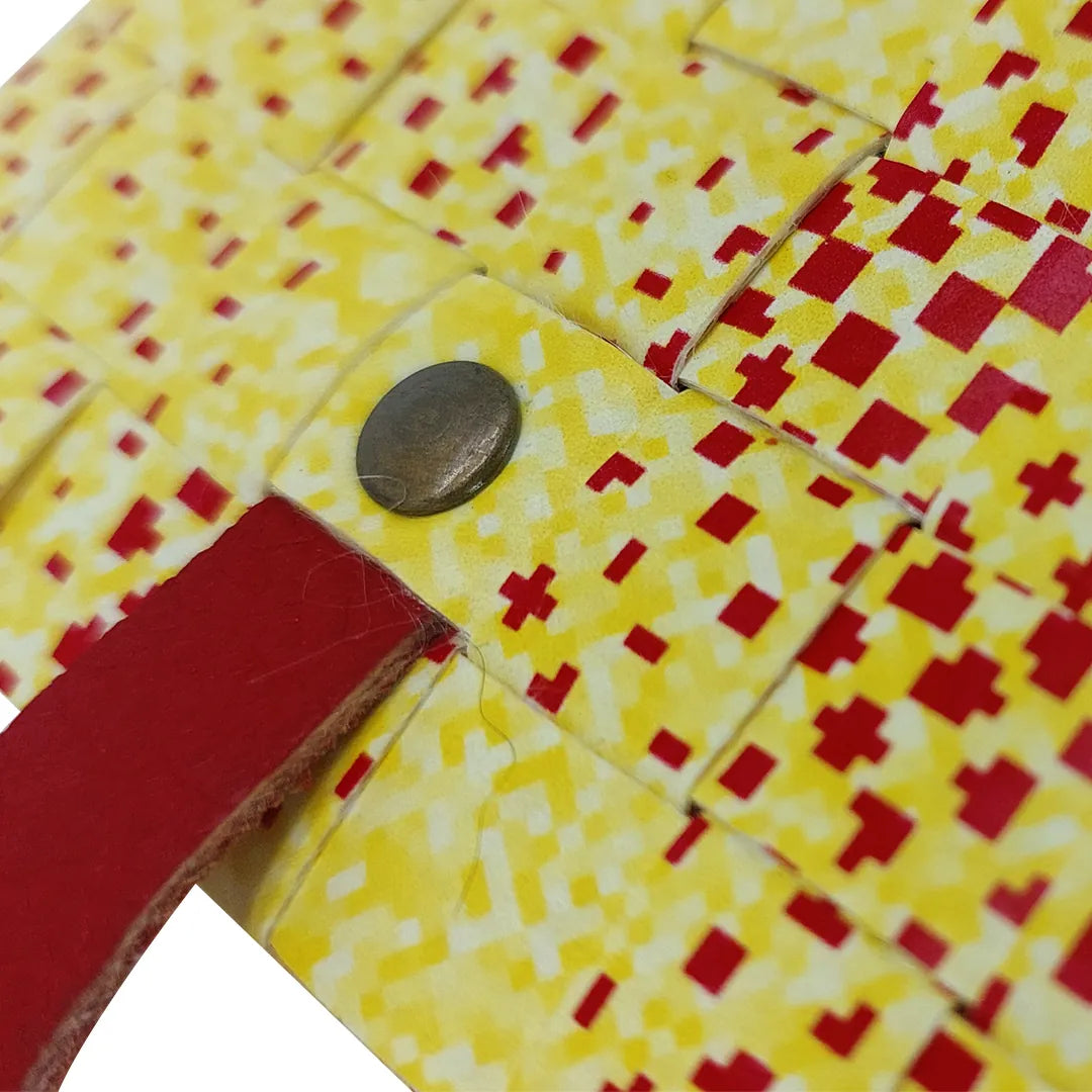 Peter Wallet 2025 is a ReCreate wallet made from reclaimed advertising banner, with red graphic marks, space for 6 cards and coins. - detail