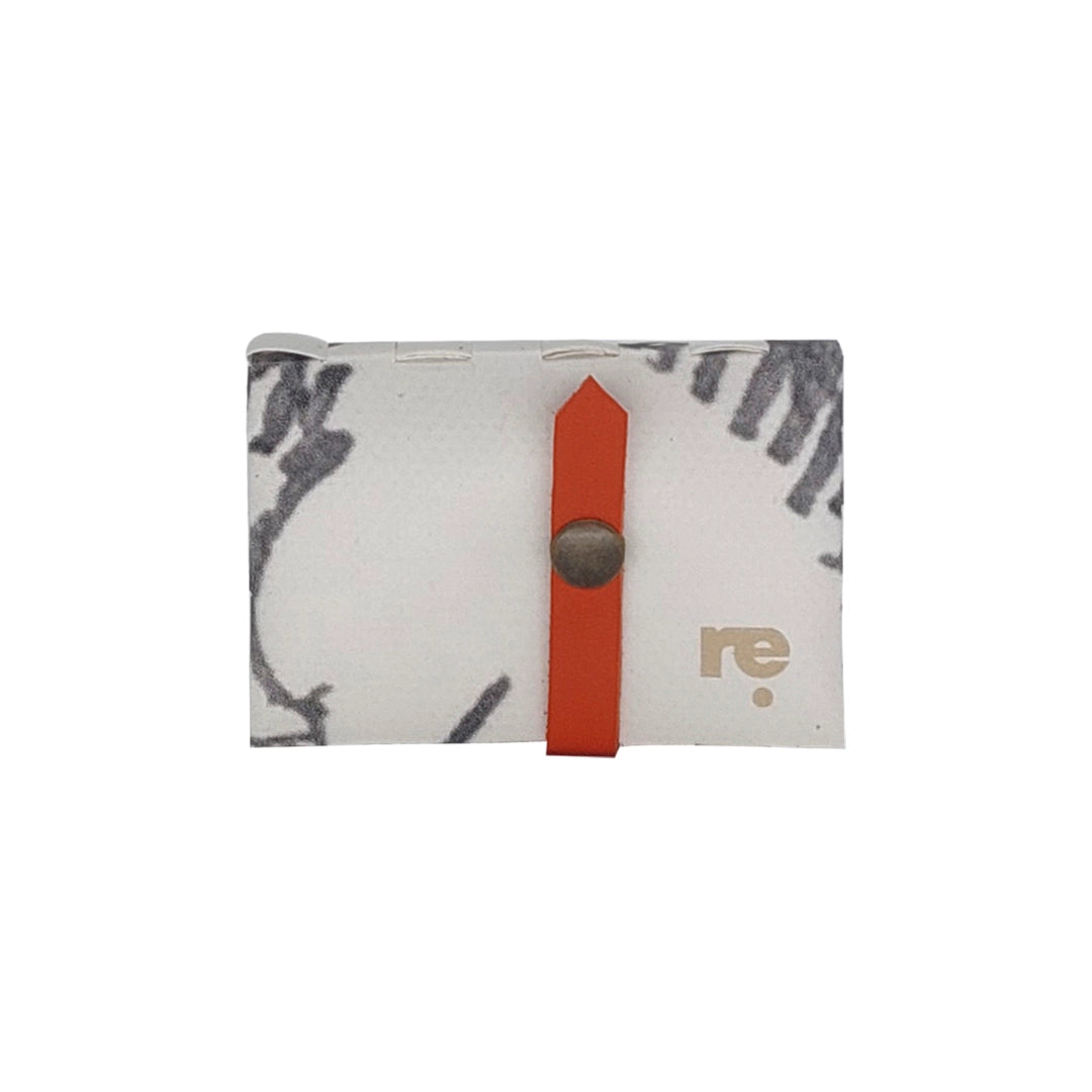 Compact numbered wallet made from reused advertising material, with space for 6 cards, coins and daily essentials.- front