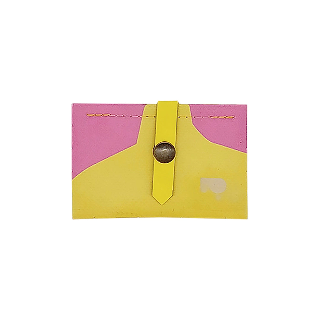 Sam Wallet 125 is a compact ReCreate wallet made from reclaimed advertising banner, with pink and yellow tones, woven detail and snap closure. - front