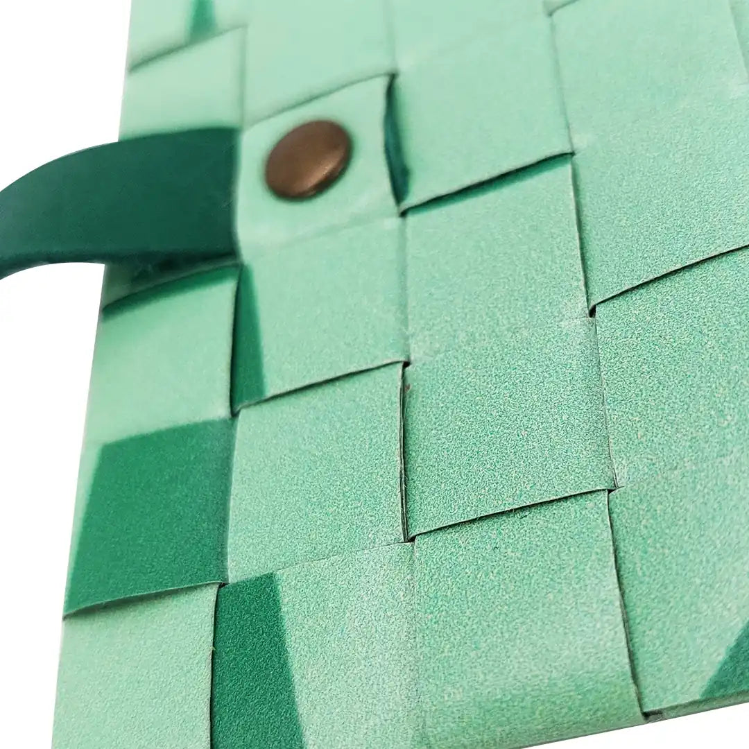 Sam Wallet 225 is a ReCreate wallet made from reclaimed advertising banner, with soft green tones, woven detail and space for up to 6 cards. - detail