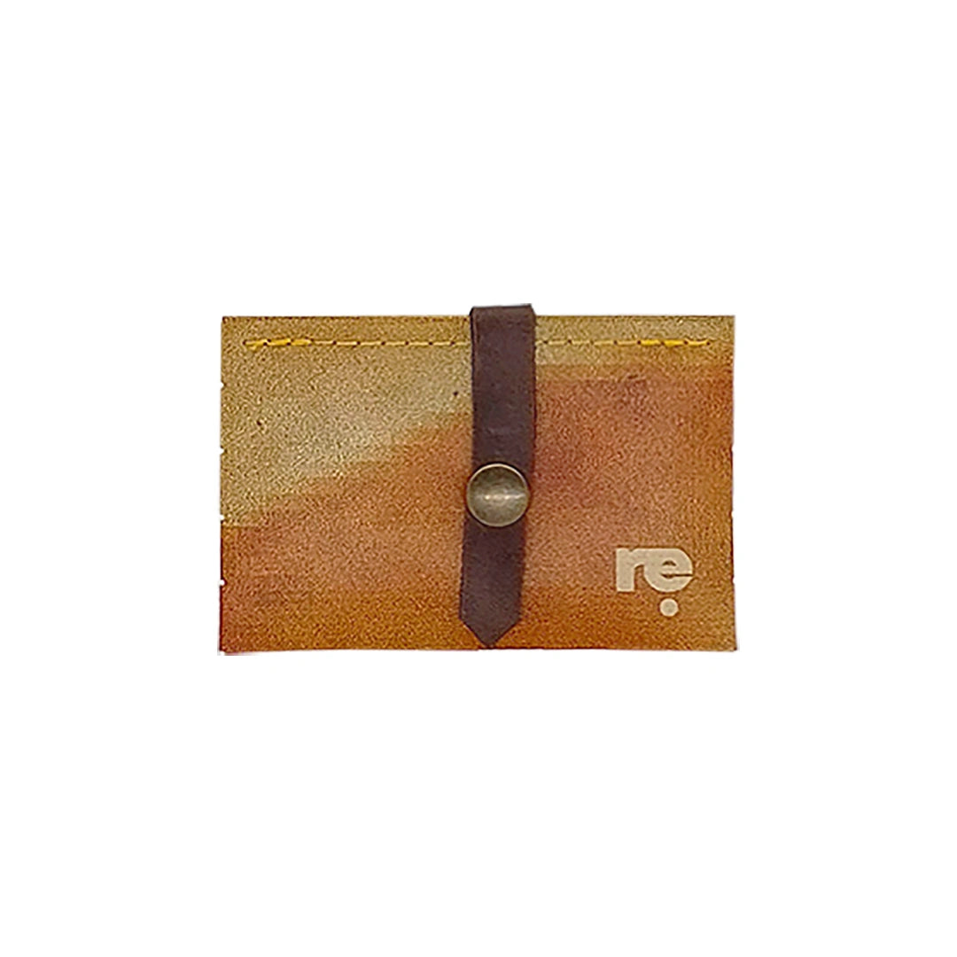 Sam Wallet 226 is a compact ReCreate wallet in reclaimed advertising banner, with warm ochre tones, woven detail and space for 6 cards. - front