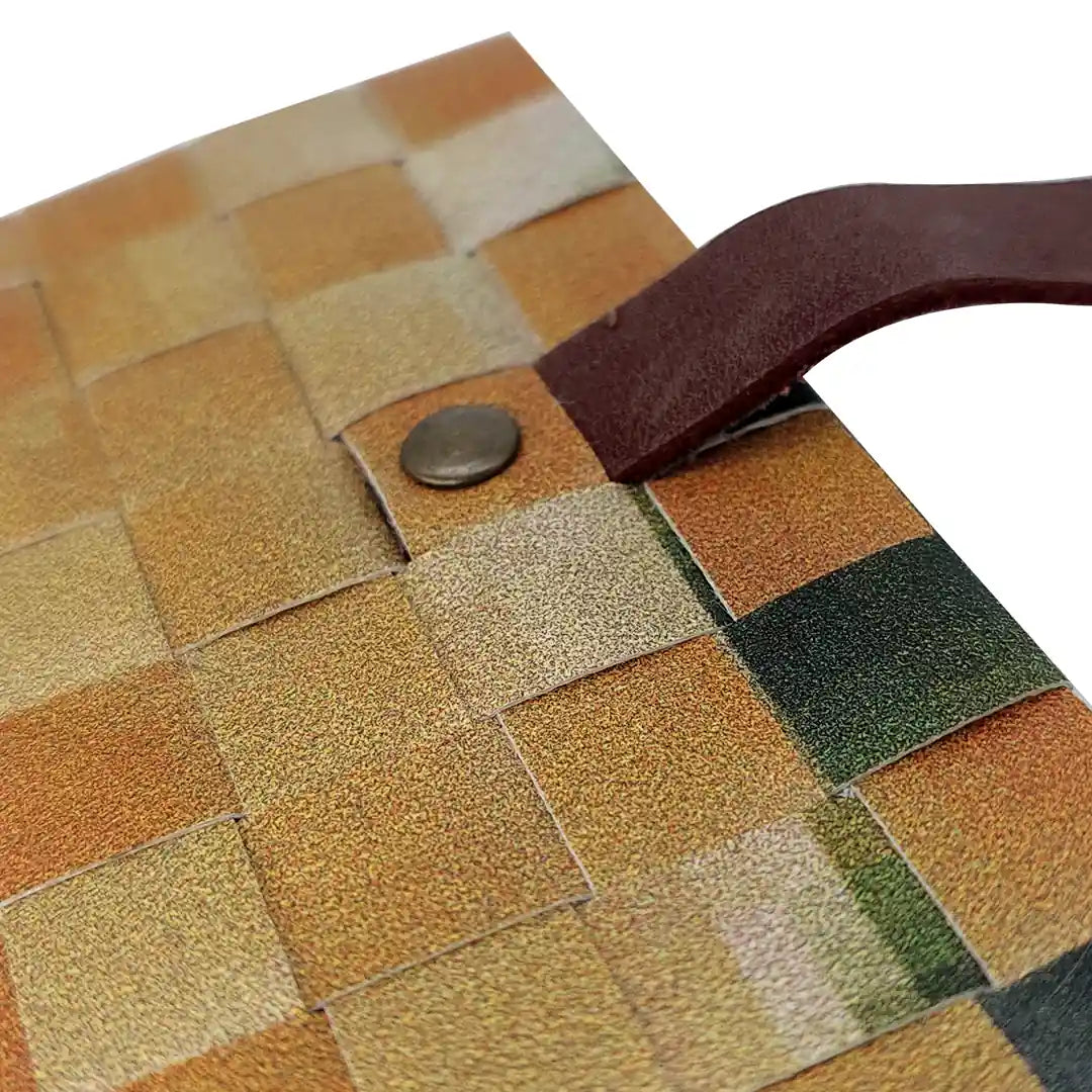 Sam Wallet 226 is a compact ReCreate wallet in reclaimed advertising banner, with warm ochre tones, woven detail and space for 6 cards. - detail