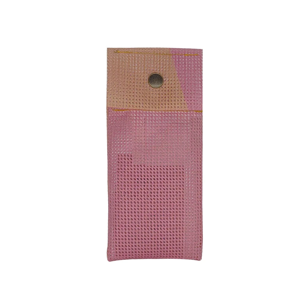 Soft pink pouch made from reclaimed micro-perforated material, designed for pencils, pens and small everyday objects. - front