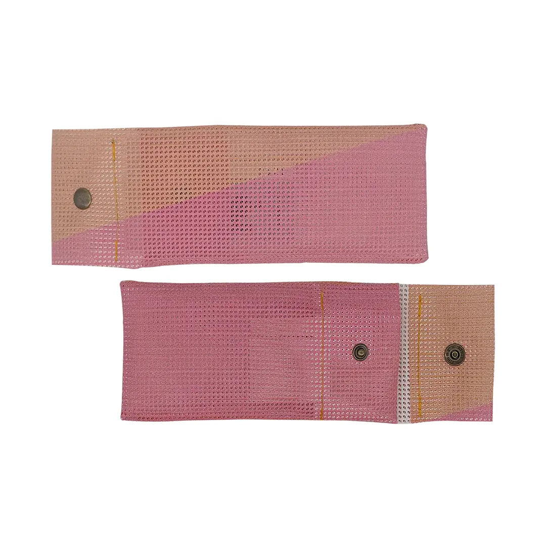 Soft pink pouch made from reclaimed micro-perforated material, designed for pencils, pens and small everyday objects. - both sides