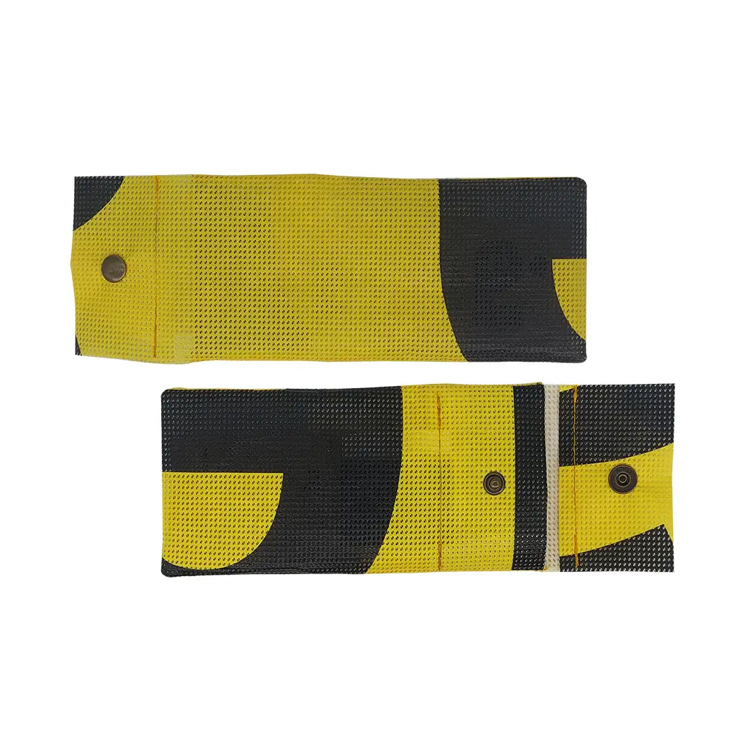 Yellow and black pouch made from reclaimed micro-perforated banner, designed to hold pencils, pens or slim everyday tools in a compact format. - both sides