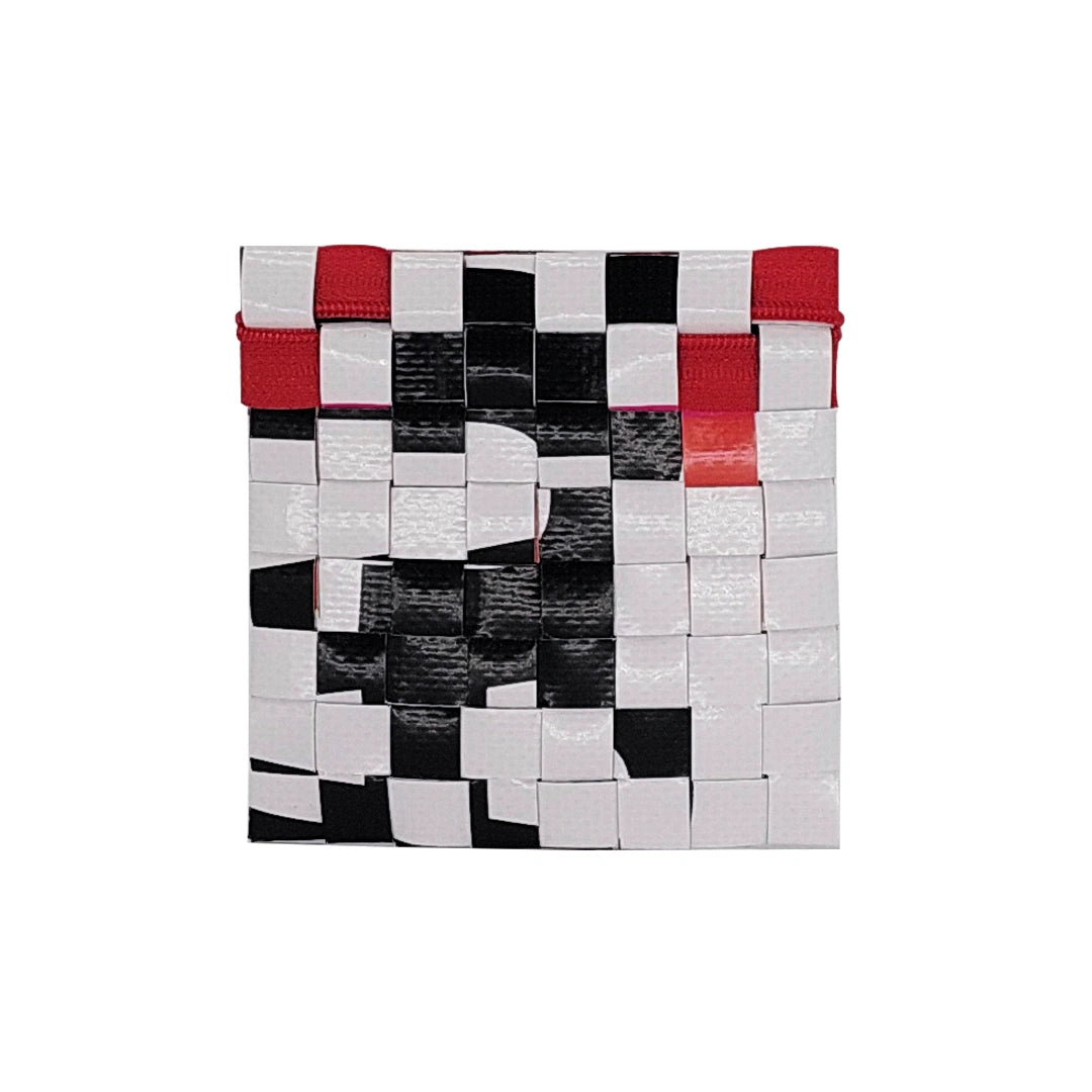 Tom Pouch 1625 is a ReCreate pouch made from reclaimed advertising banner, with black and white graphic shapes, red zip and woven back. - back