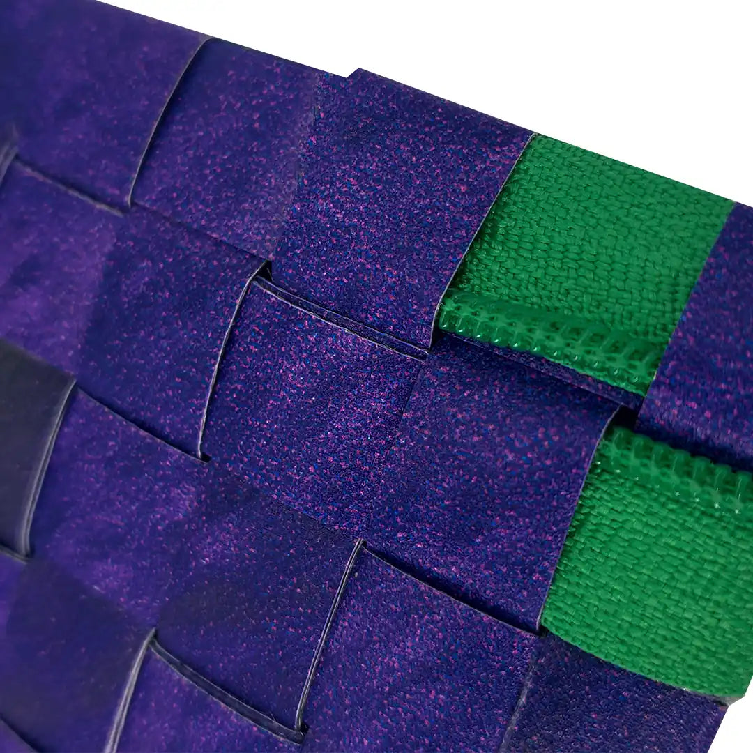 Tom Pouch 226 is a ReCreate pouch made from reclaimed advertising banner, with deep violet tones, green zip and woven back. - detail